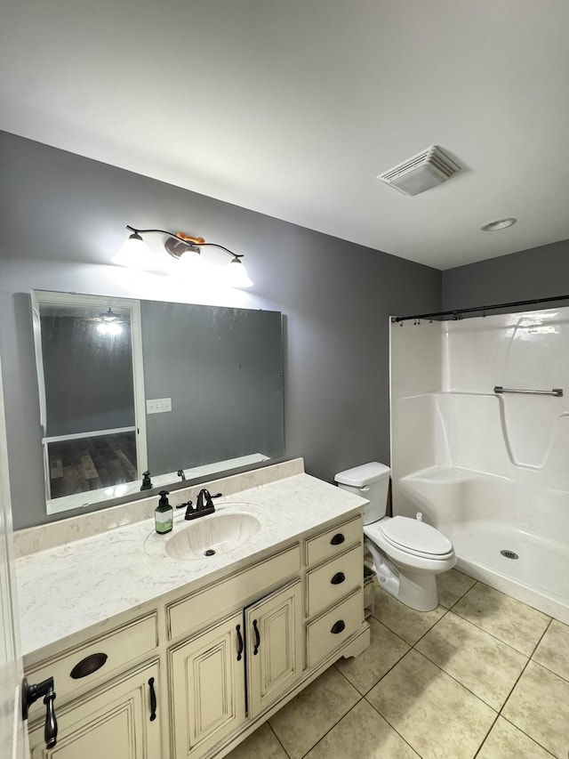 117 Raspberry Dr, Winchester, TN 37398 - bathroom featuring tile patterned floors, vanity, and a shower