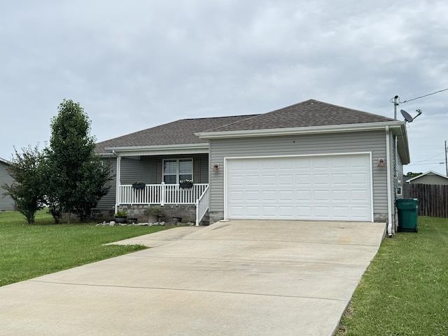 117 Raspberry Dr, Winchester, TN 37398 - ranch-style home featuring a porch, a front yard, concrete driveway, an attached garage, and a shingled roof