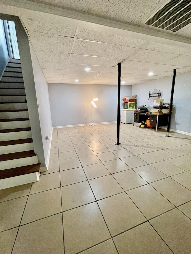 126 E Laurel Dr, Lawrenceburg, TN 38464 - finished below grade area featuring tile patterned floors, stairway, recessed lighting, and baseboards
