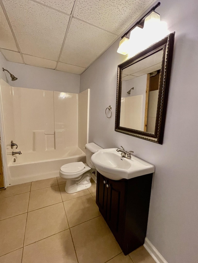 126 E Laurel Dr, Lawrenceburg, TN 38464 - bathroom featuring a paneled ceiling, toilet, washtub / shower combination, vanity, and tile patterned floors