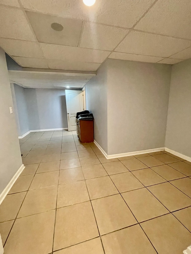 126 E Laurel Dr, Lawrenceburg, TN 38464 - finished basement featuring light tile patterned floors, a drop ceiling, and baseboards