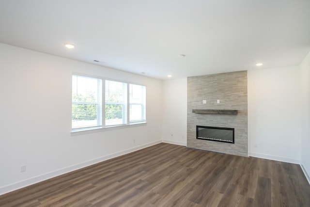 120 W Cassa Way, Mount Juliet, TN 37122 - unfurnished living room with a fireplace, dark wood-style floors, baseboards, and recessed lighting