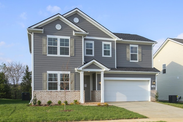 122 W Cassa Way, Mount Juliet, TN 37122 - view of front facade with concrete driveway, a garage, a front lawn, and central air condition unit