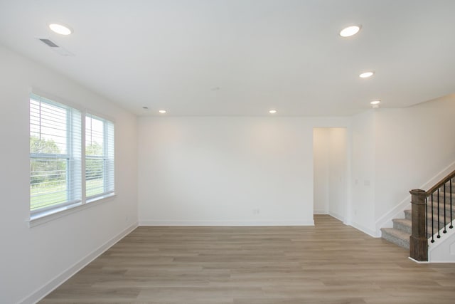 122 W Cassa Way, Mount Juliet, TN 37122 - spare room with light wood-style floors, recessed lighting, stairway, and baseboards