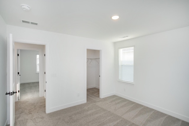 122 W Cassa Way, Mount Juliet, TN 37122 - unfurnished bedroom with multiple windows, light colored carpet, and baseboards