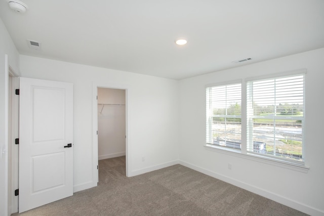 122 W Cassa Way, Mount Juliet, TN 37122 - unfurnished bedroom featuring baseboards, light carpet, a spacious closet, a closet, and recessed lighting