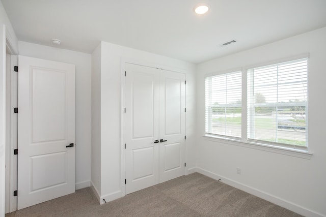 122 W Cassa Way, Mount Juliet, TN 37122 - unfurnished bedroom featuring light carpet, baseboards, a closet, and recessed lighting