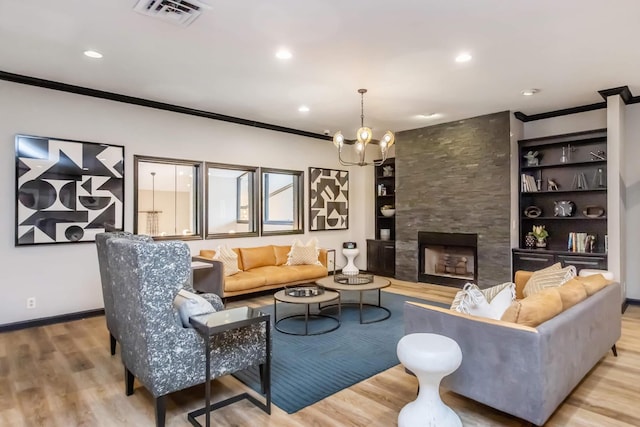 2433 Kennedy Ct Unit 2433, Franklin, TN 37064 - living room with ornamental molding, wood finished floors, a chandelier, baseboards, and recessed lighting