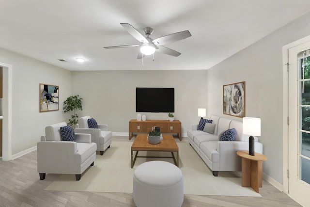 2433 Kennedy Ct Unit 2433, Franklin, TN 37064 - living room featuring ceiling fan, light wood-type flooring, and baseboards