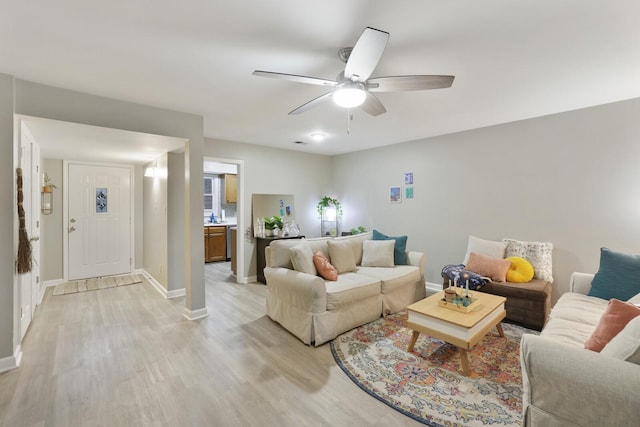 2433 Kennedy Ct Unit 2433, Franklin, TN 37064 - living room with light wood-style flooring, ceiling fan, and baseboards