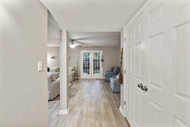 2433 Kennedy Ct Unit 2433, Franklin, TN 37064 - sitting room with french doors, light wood finished floors, ceiling fan, and baseboards