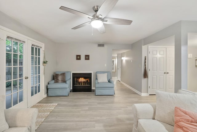 2433 Kennedy Ct Unit 2433, Franklin, TN 37064 - living area with french doors, light wood-style flooring, and a ceiling fan