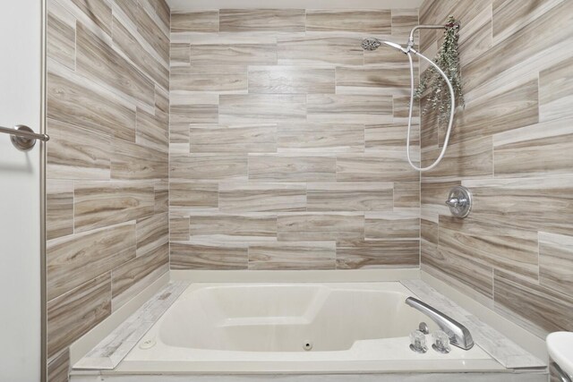 2433 Kennedy Ct Unit 2433, Franklin, TN 37064 - bathroom featuring a combined bath / shower with jetted tub and toilet
