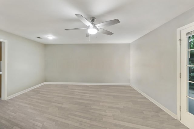 2433 Kennedy Ct Unit 2433, Franklin, TN 37064 - spare room with ceiling fan, baseboards, and light wood-type flooring