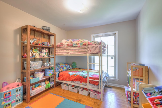 1111 Greenhill St, Murfreesboro, TN 37129 - bedroom featuring multiple windows, hardwood / wood-style flooring, and baseboards