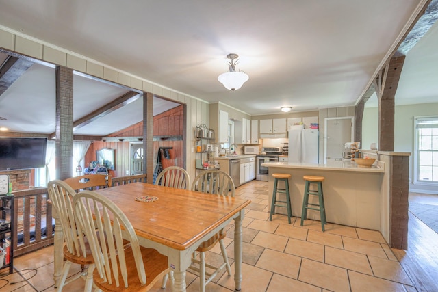 1111 Greenhill St, Murfreesboro, TN 37129 - dining room featuring wood walls and light tile patterned flooring