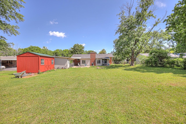 1111 Greenhill St, Murfreesboro, TN 37129 - view of grassy yard featuring a carport