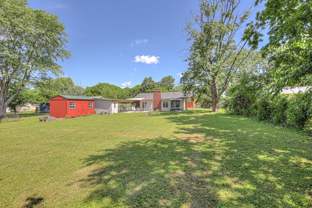 1111 Greenhill St, Murfreesboro, TN 37129 - view of yard with an outdoor structure