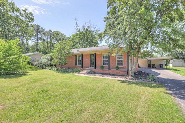 1111 Greenhill St, Murfreesboro, TN 37129 - ranch-style house featuring brick siding, asphalt driveway, covered porch, a front yard, and an attached carport