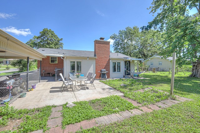 1111 Greenhill St, Murfreesboro, TN 37129 - back of property featuring a chimney and a patio