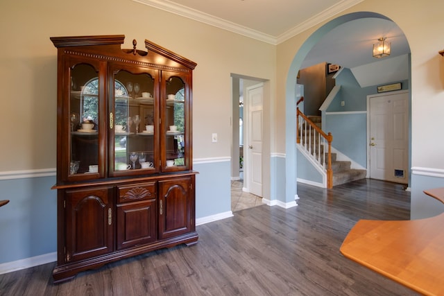 237 Dandridge Dr, Franklin, TN 37067 - entryway with wood finished floors, crown molding, arched walkways, stairway, and baseboards