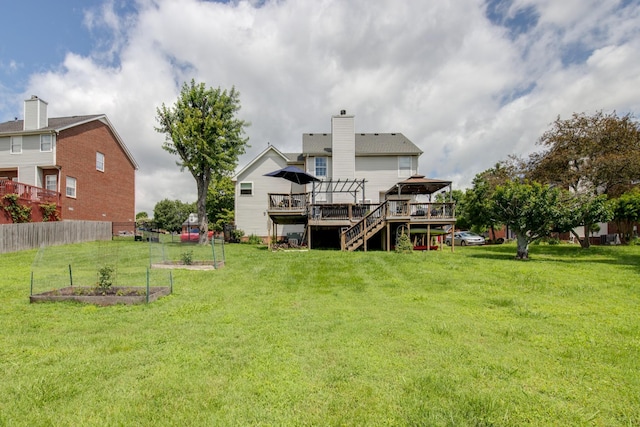237 Dandridge Dr, Franklin, TN 37067 - back of house with a gazebo, a deck, a garden, and a chimney