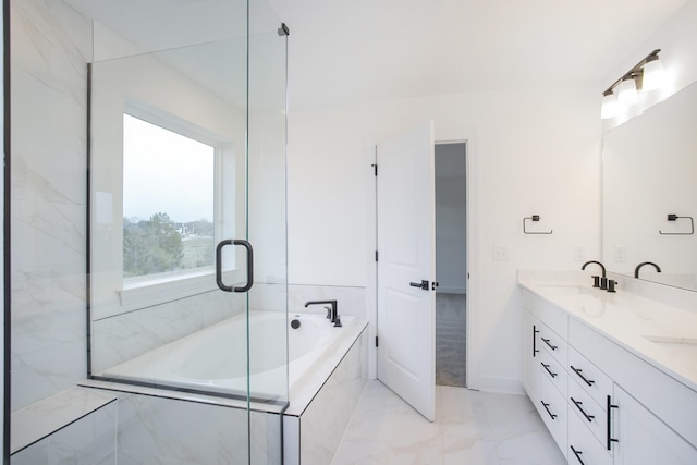 133 W Cassa Way, Mount Juliet, TN 37122 - bathroom featuring marble finish floors, a tub with marble appearance, double vanity, and baseboards