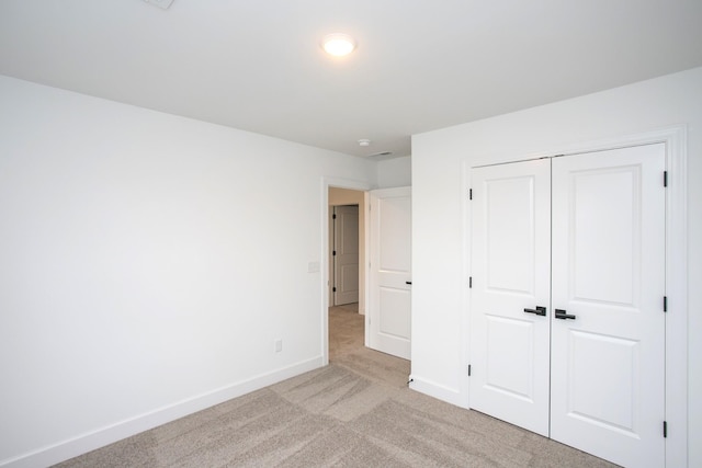 133 W Cassa Way, Mount Juliet, TN 37122 - unfurnished bedroom featuring light colored carpet, baseboards, and a closet