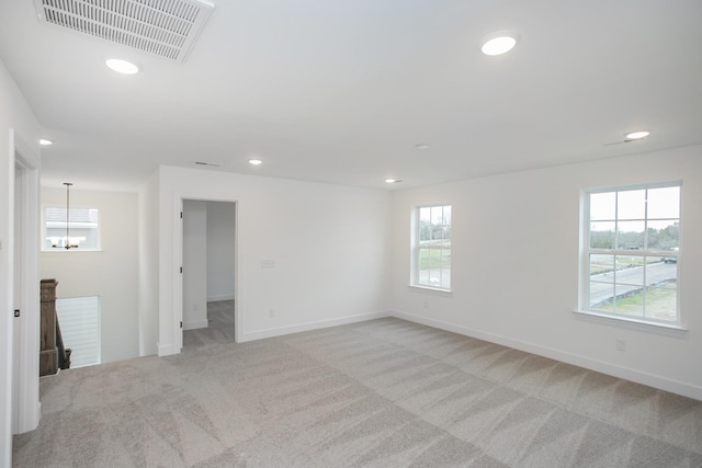 133 W Cassa Way, Mount Juliet, TN 37122 - unfurnished room with a chandelier, plenty of natural light, light colored carpet, and recessed lighting