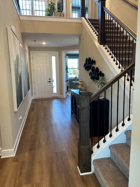 131 W Cassa Way, Mount Juliet, TN 37122 - entryway with wood finished floors, stairs, a towering ceiling, and baseboards