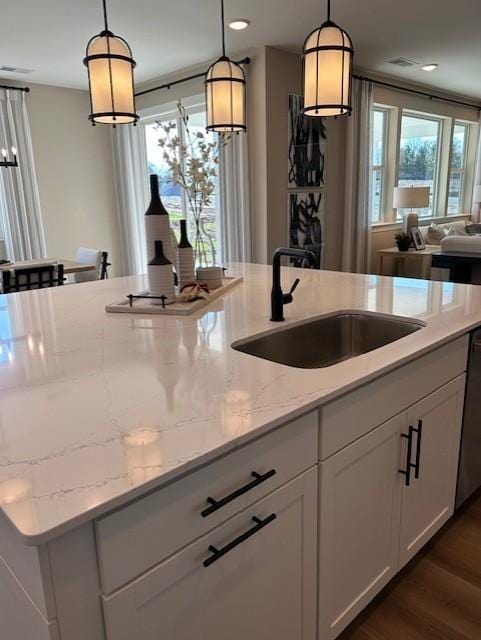131 W Cassa Way, Mount Juliet, TN 37122 - kitchen with plenty of natural light, a sink, light stone counters, white cabinets, and recessed lighting