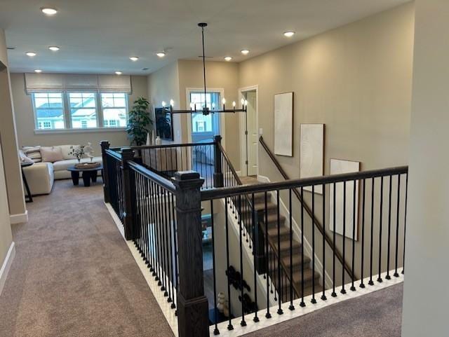 131 W Cassa Way, Mount Juliet, TN 37122 - corridor with an upstairs landing, carpet flooring, recessed lighting, baseboards, and a chandelier