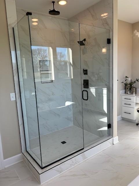 131 W Cassa Way, Mount Juliet, TN 37122 - full bath with marble look tiles, baseboards, a marble finish shower, and recessed lighting