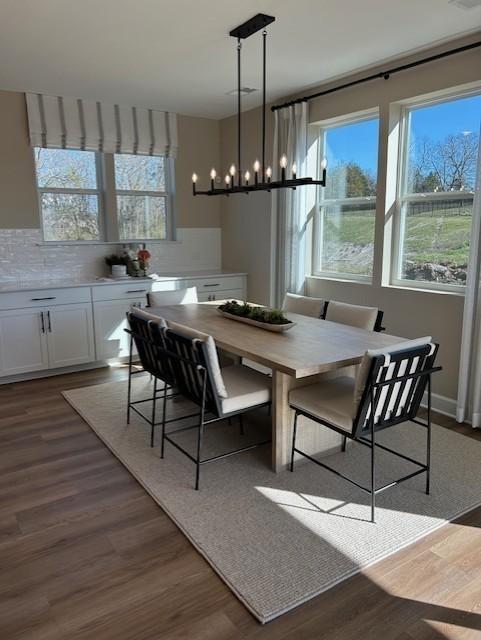 131 W Cassa Way, Mount Juliet, TN 37122 - dining space featuring a chandelier and dark wood-style floors