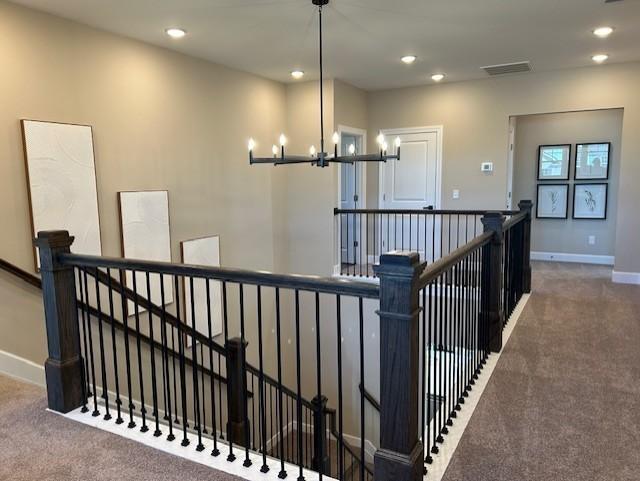 131 W Cassa Way, Mount Juliet, TN 37122 - staircase with carpet flooring, recessed lighting, a chandelier, and baseboards