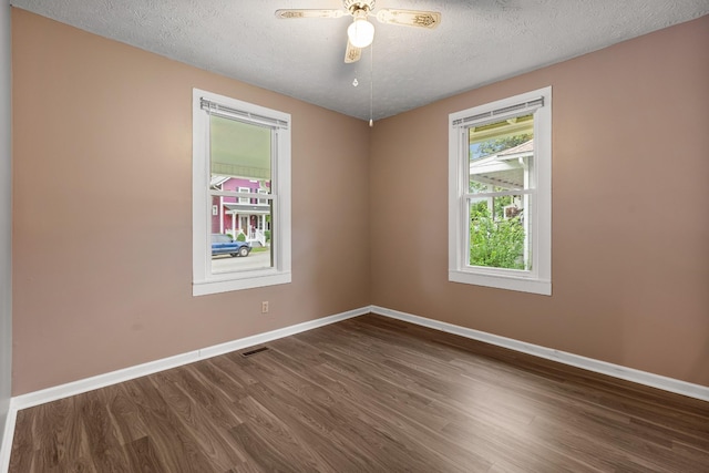 1007 Birdsall St, Old Hickory, TN 37138 - spare room with dark wood-style flooring, a textured ceiling, baseboards, and ceiling fan