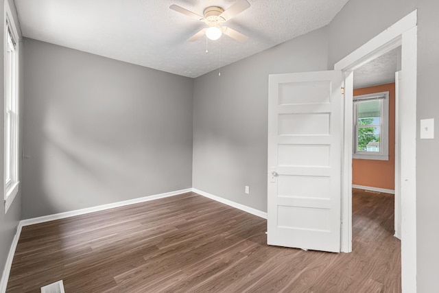 1007 Birdsall St, Old Hickory, TN 37138 - unfurnished room featuring ceiling fan, wood finished floors, a textured ceiling, and baseboards