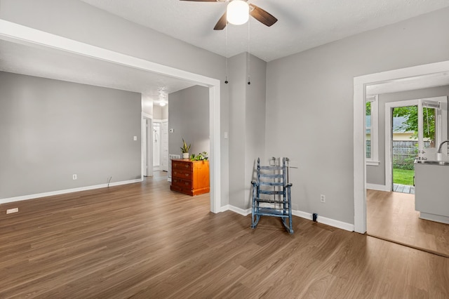 1007 Birdsall St, Old Hickory, TN 37138 - living area featuring wood finished floors, a ceiling fan, and baseboards