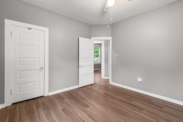 1007 Birdsall St, Old Hickory, TN 37138 - spare room with wood finished floors, baseboards, a textured ceiling, and a ceiling fan