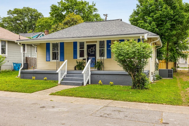 1007 Birdsall St, Old Hickory, TN 37138 - bungalow-style house with a porch, roof with shingles, a front yard, and central AC
