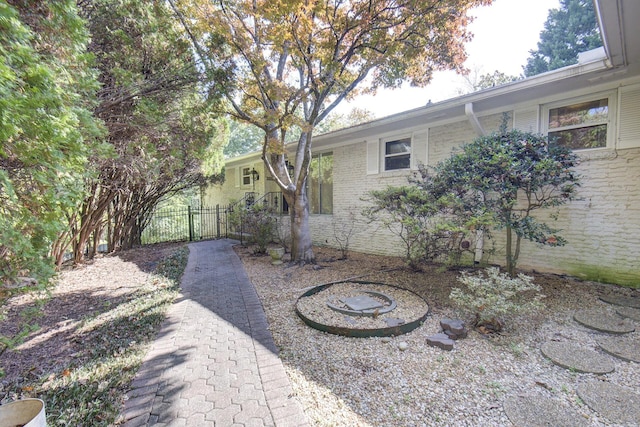 view of yard with a gate