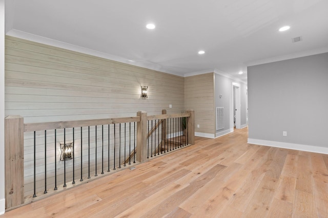 1440 Bowman Rd, Hixson, TN 37343 - empty room with crown molding, baseboards, recessed lighting, wood finished floors, and wood walls