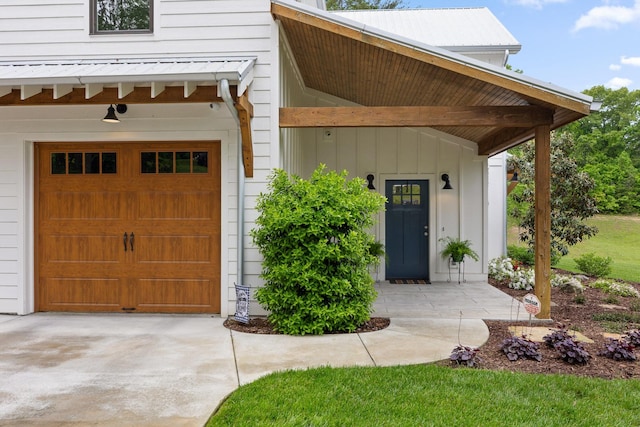 1440 Bowman Rd, Hixson, TN 37343 - property entrance with driveway and an attached garage