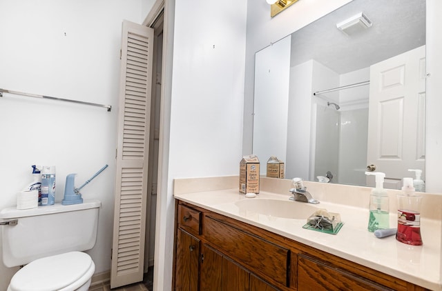 1500 Rice Hill Ct, Antioch, TN 37013 - bathroom with a closet, vanity, toilet, and a shower