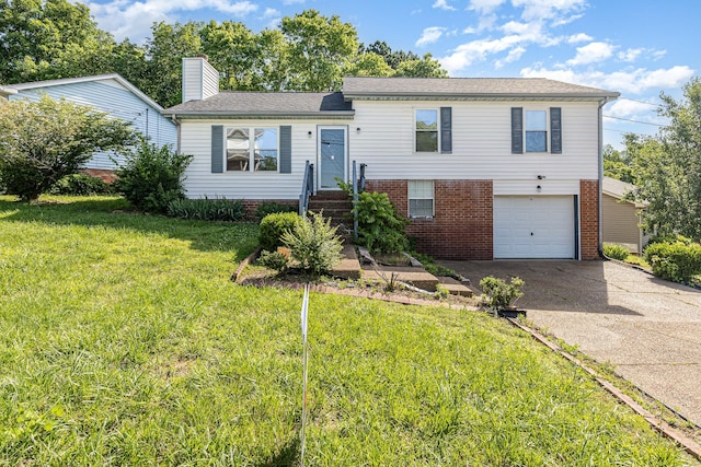 1500 Rice Hill Ct, Antioch, TN 37013 - tri-level home with driveway, an attached garage, a chimney, a front yard, and brick siding