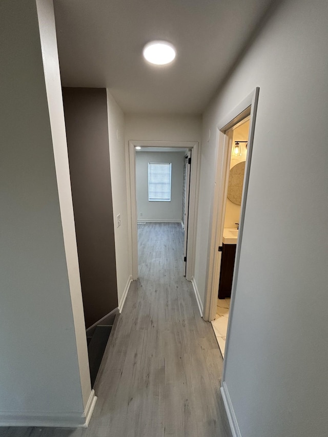3221 New Towne Rd, Antioch, TN 37013 - corridor with light wood-style flooring and baseboards