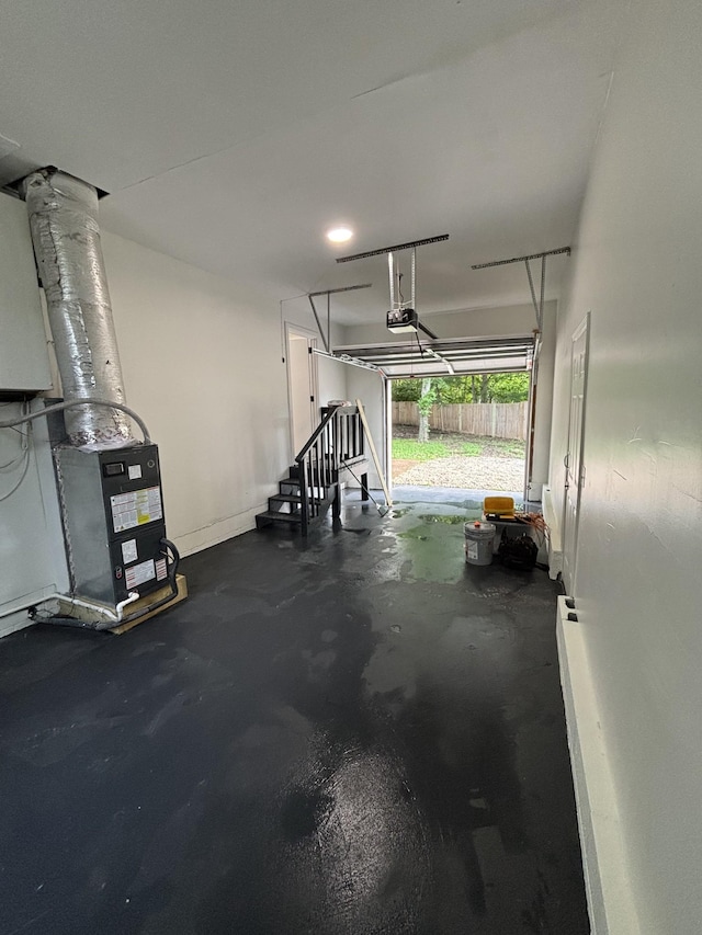 3221 New Towne Rd, Antioch, TN 37013 - garage with a garage door opener and baseboards