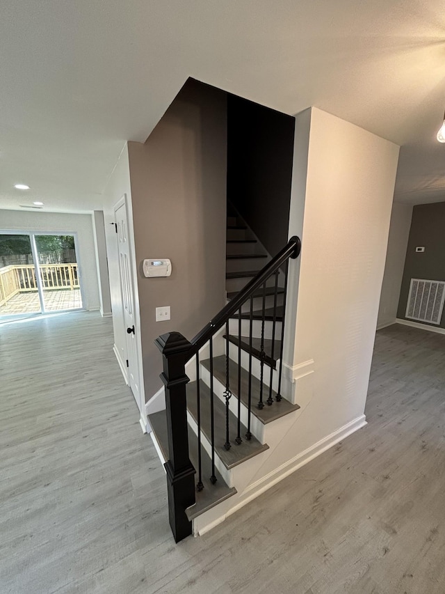 3221 New Towne Rd, Antioch, TN 37013 - stairs featuring wood finished floors and baseboards