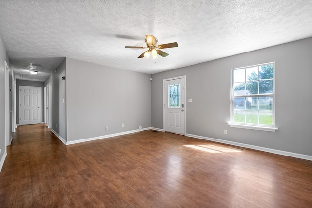 919 Linda Dr, Oak Grove, KY 42262 - foyer with wood finished floors, a ceiling fan, baseboards, and a textured ceiling