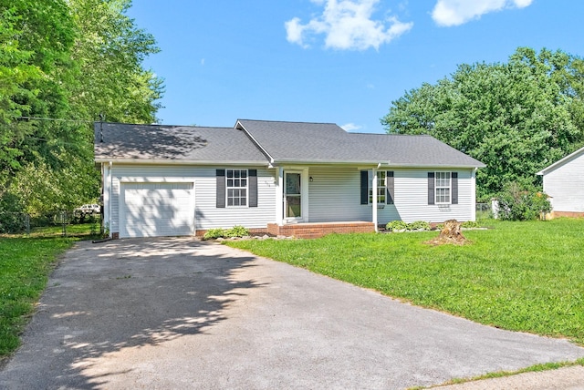 919 Linda Dr, Oak Grove, KY 42262 - ranch-style house with a garage, driveway, a front yard, and a shingled roof